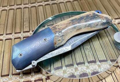 Stephen Olszewski Blue Mammoth Fossil Anodized Blue Mosaic Damascus Linerlock Knife - Image 4
