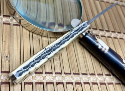 David R. Davis Trammell Creek Mammoth Fossil & Pearl Damascus Large Swayback Jack Knife - Image 3