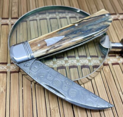 David R. Davis Trammell Creek Mammoth Fossil & Pearl Damascus Large Swayback Jack Knife - Image 5