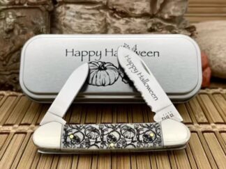 Case XX USA 2022 Natural Bone Skulls HALLOWEEN 10617 Canoe Knife in Tin