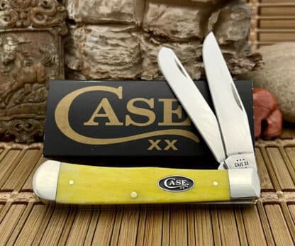 Case XX USA 2024 Smooth Yellow Bone Black Oval 20030 Trapper Pocket Knife