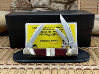 Buck 303 USA Painted Pony Gold Lip Pearl & Bloody Jasper Cadet Knife