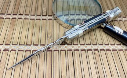 Buck 110 Painted Pony PROTOTYPE – Ebony & Mammoth Ivory Jaguar | Hand Engraved - Image 2