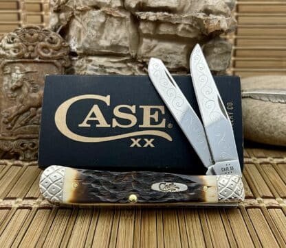 Engraved Peachseed Amber Bone Trapper – Case XX