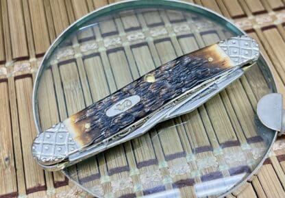Case XX Peachseed Amber Bone Muskrat Knife – #016 of 100 - Image 2