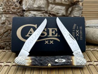 Hand-fired peachseed amber bone muskrat by Case XX