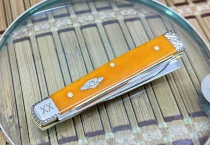 Striking Engraved Persimmon Bone Baby Doc: Limited Edition Gem - Image 2