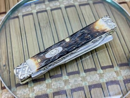 Case XX Hand-Fired Peachseed Amber Bone Baby Doc Knife – #006/100 - Image 2