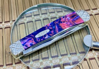 Gleaming Engraved Pink Sapphire Trapper Pocket Knife - Image 2