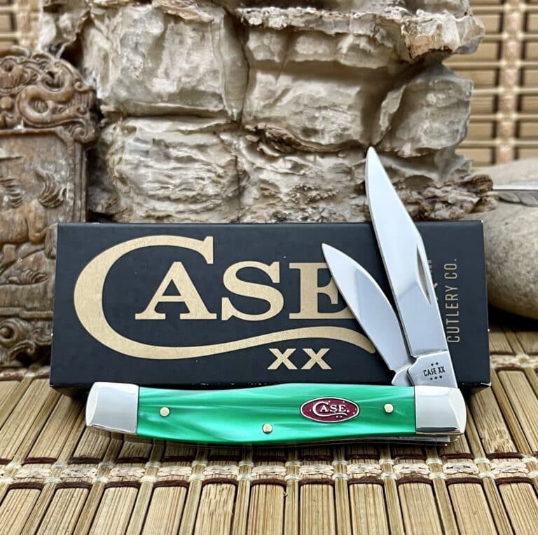Case XX Texas Jack pocket knife with a green pearl kirinite handle, shown open in front of its Case box