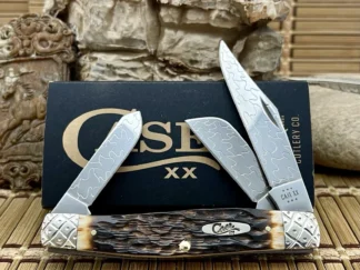 Beautiful case hand fired amber bone large stockman #50/100