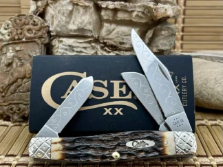 Beautiful case hand fired amber bone large stockman #52/100