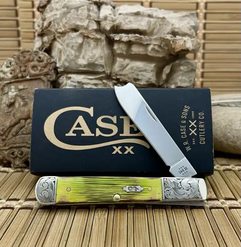 Case XX Razor pocket knife with a lime green bone handle and scrolled bolsters, shown open in front of its Case box