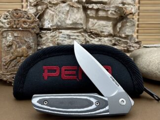 Distinctive enrique pena camo carbon caballero front flipper knife