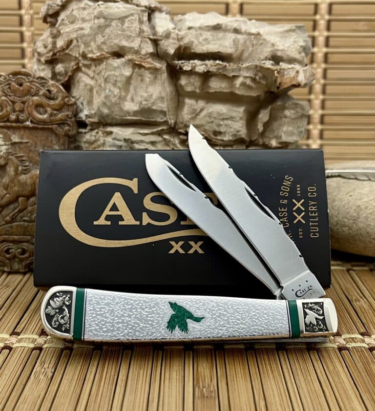 Case XX Trapper pocket knife with a silver handle featuring a mallard duck in imperial jade, shown open in front of its Case box