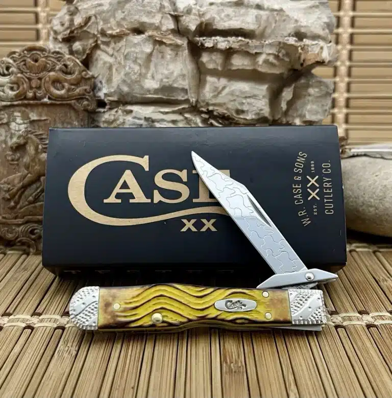 Case XX Cheetah Cub customized by Wild Horse Custom with a yellow jigged bone handle, shown open in front of its Case box